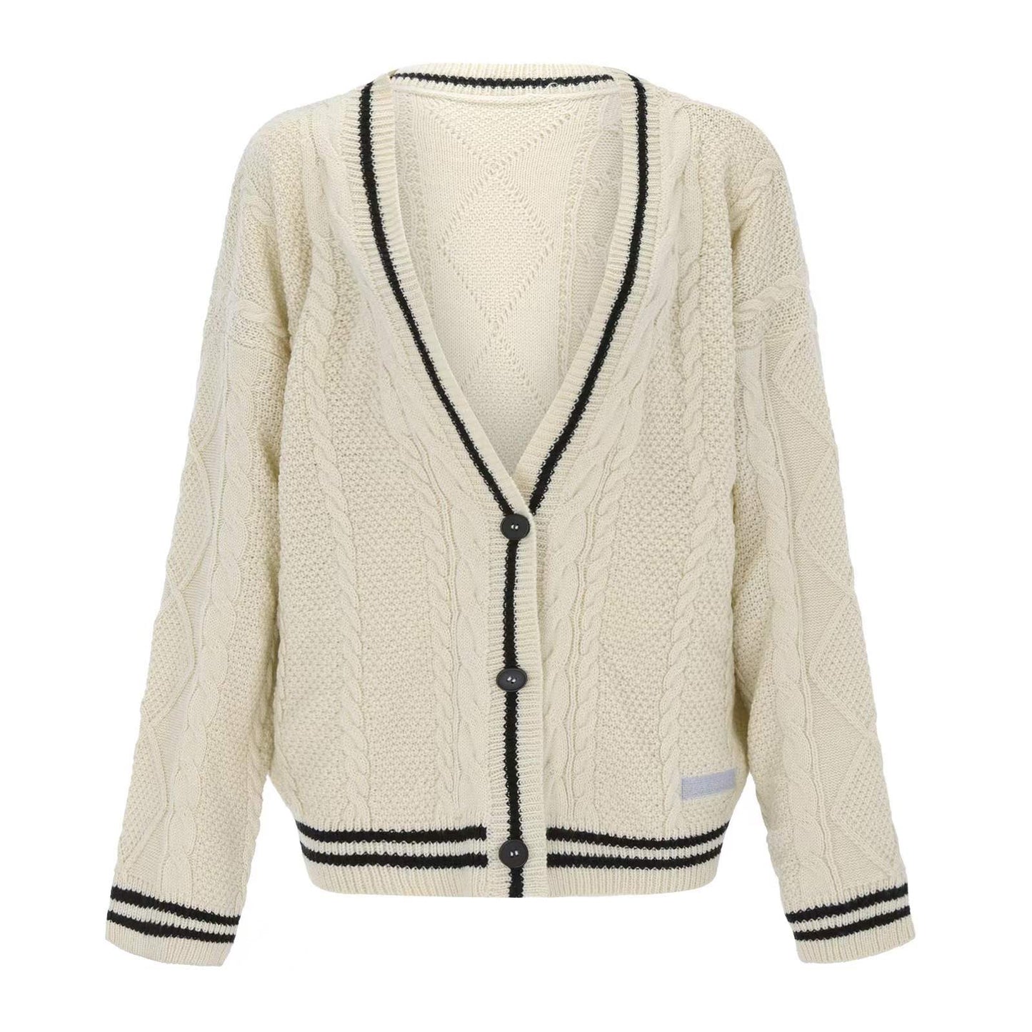 Cardigan oversize en maille torsadée brodée d'étoiles