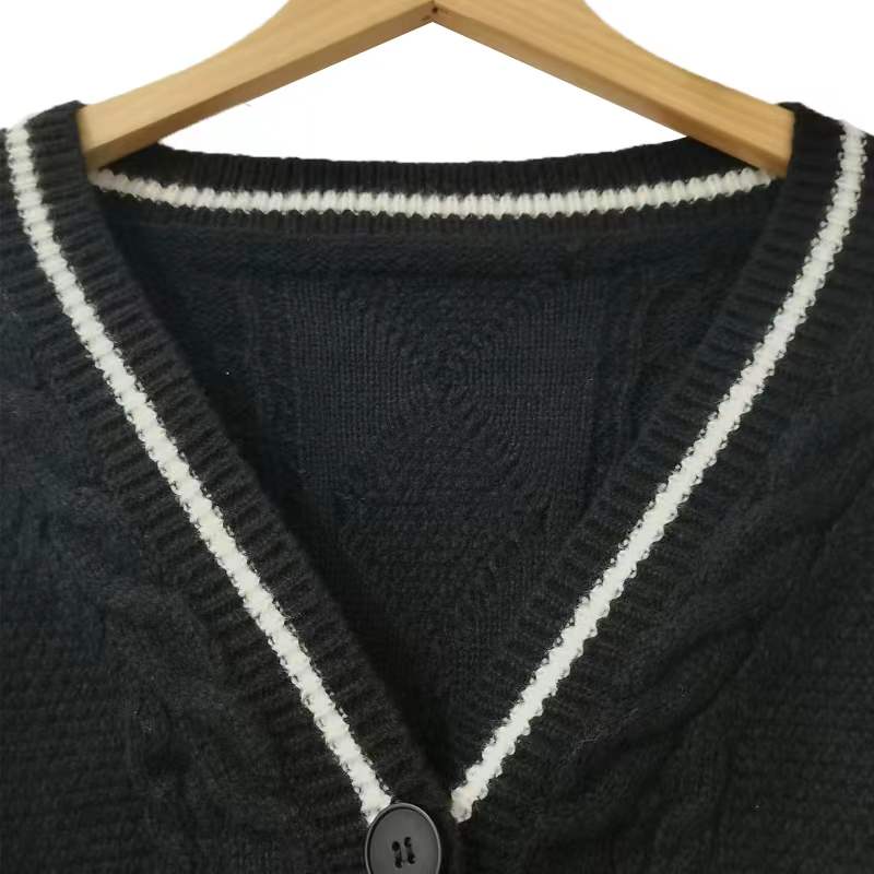 Cardigan oversize en maille torsadée brodée d'étoiles