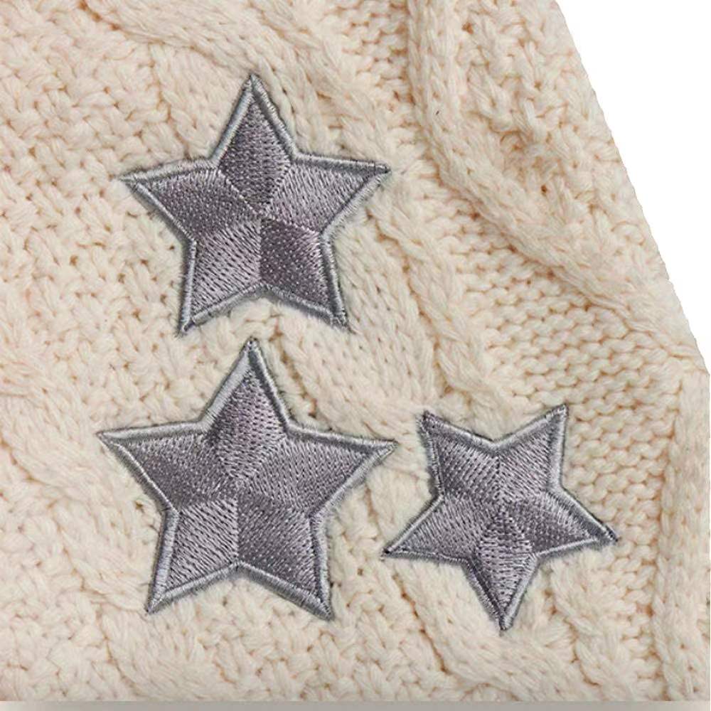 Cardigan oversize en maille torsadée brodée d'étoiles