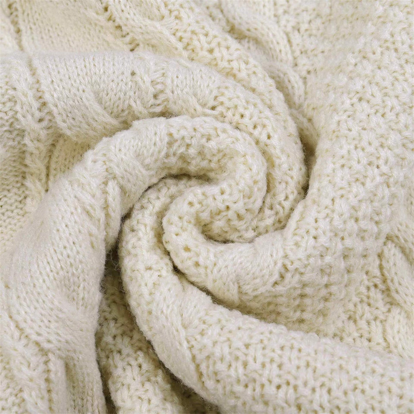 Cardigan oversize en maille torsadée brodée d'étoiles