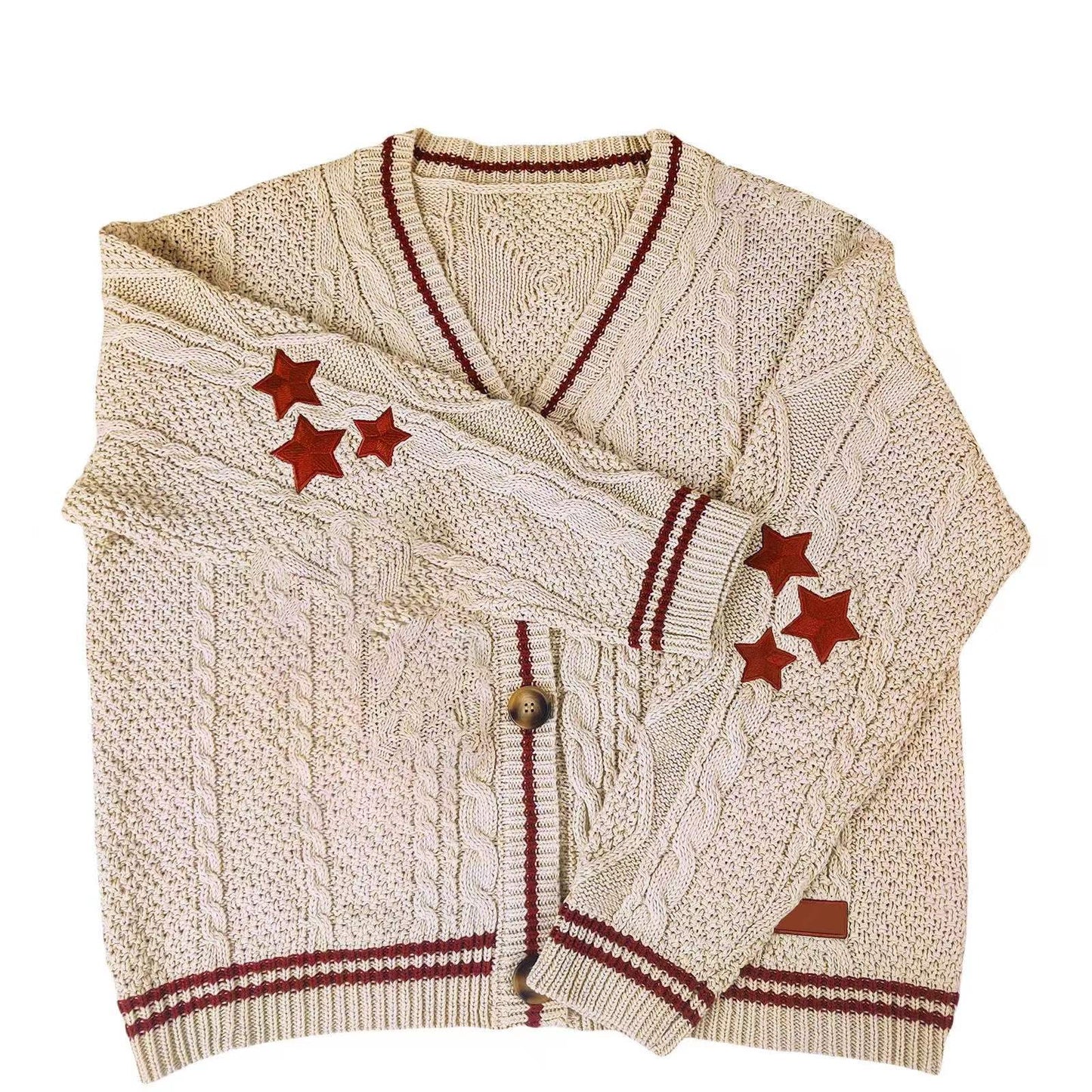 Cardigan oversize en maille torsadée brodée d'étoiles