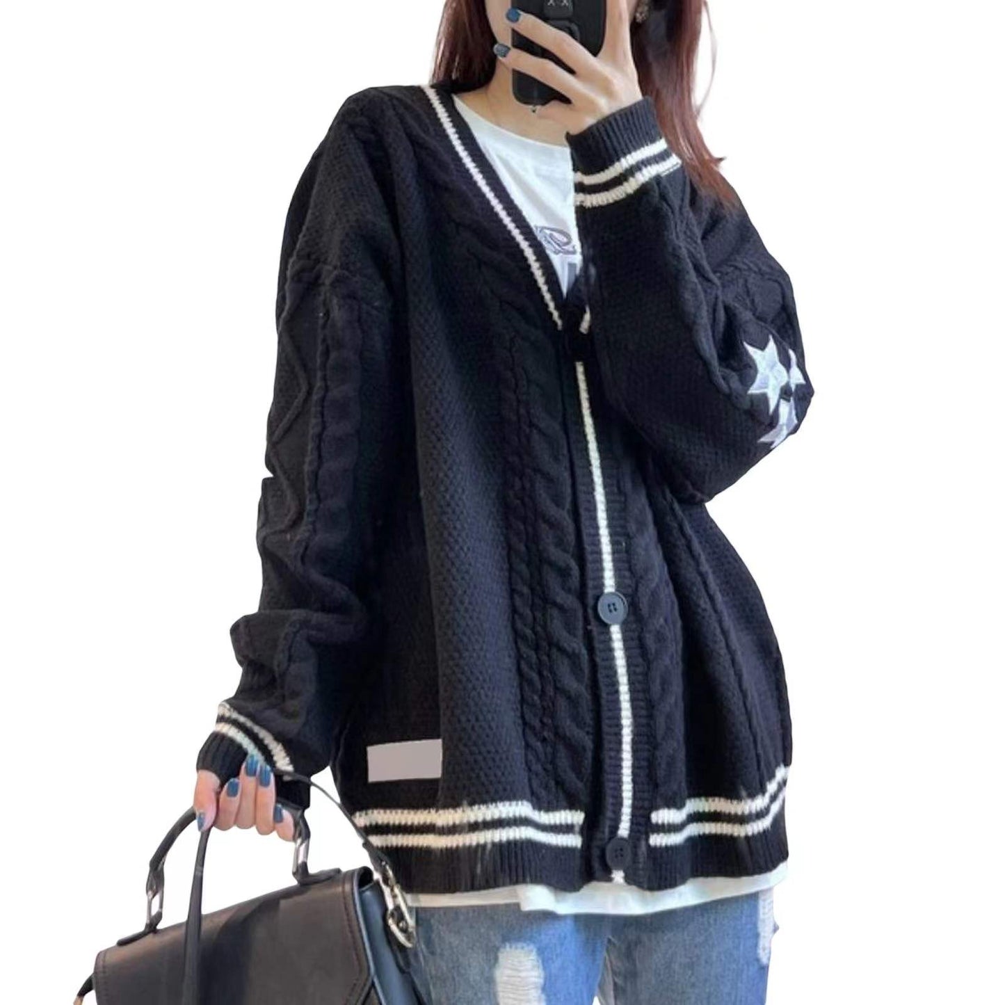 Cardigan oversize en maille torsadée brodée d'étoiles