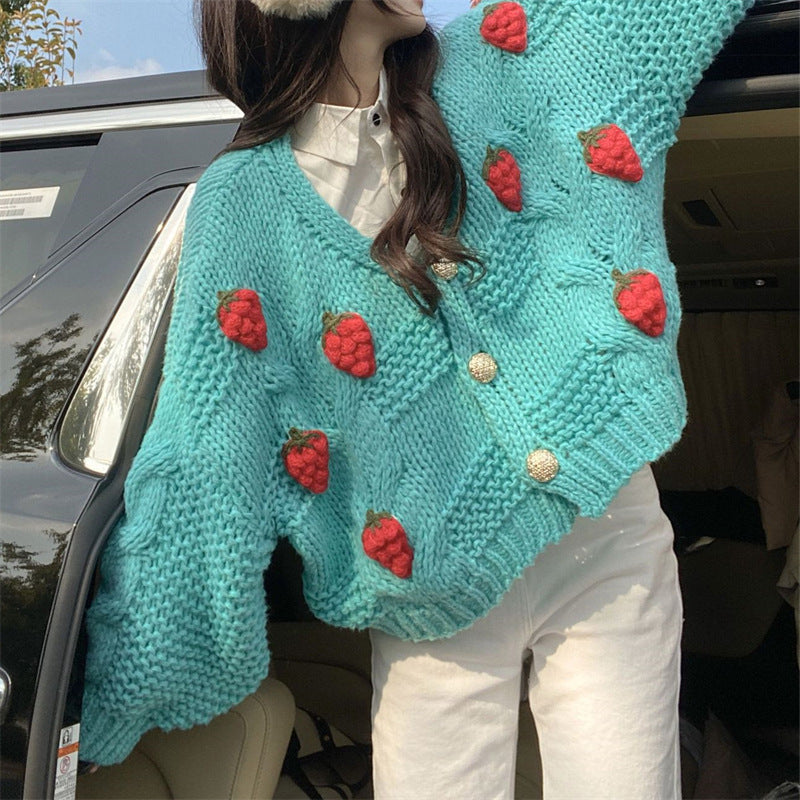 Cardigan en maille torsadée brodée